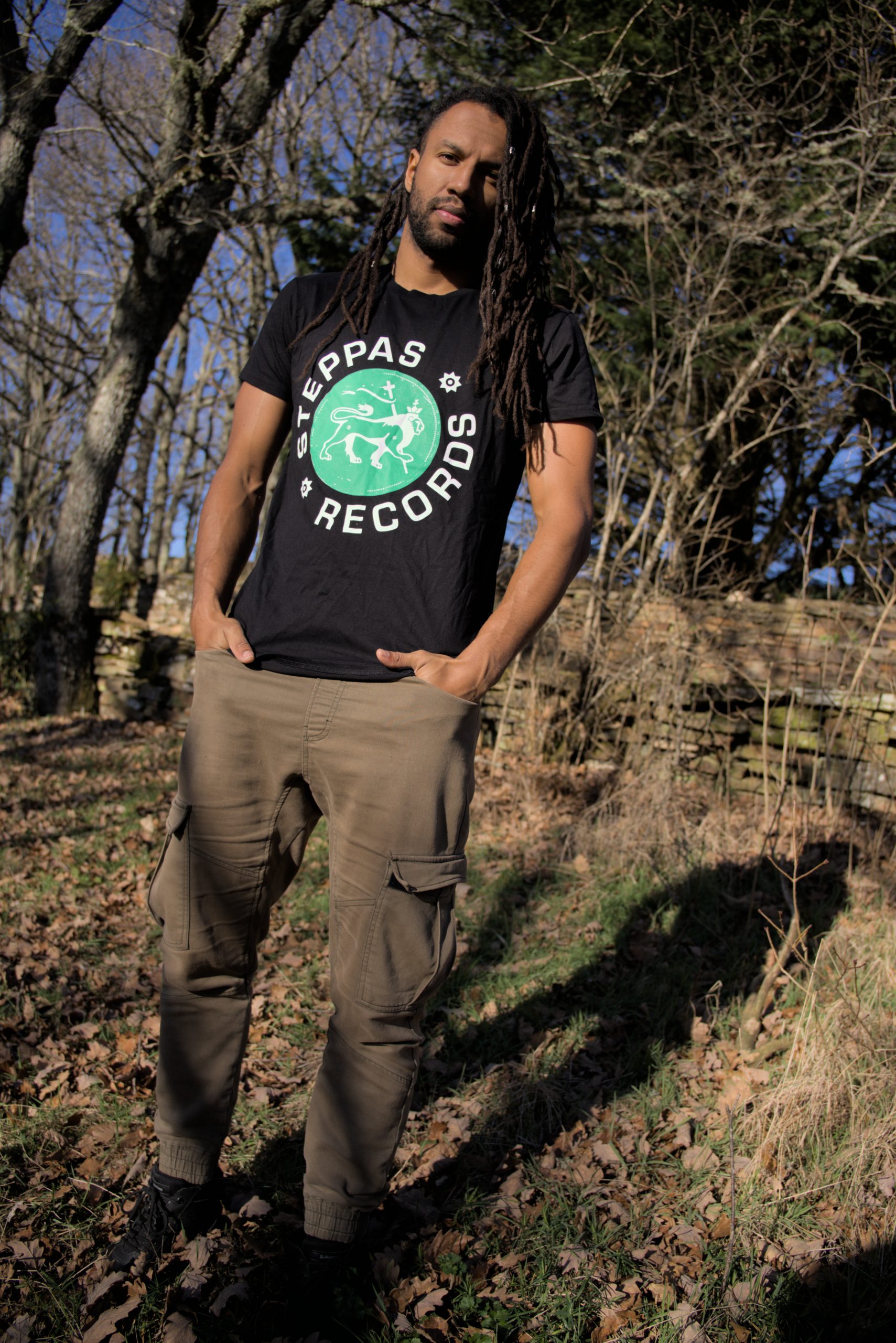 Steppas "Lion" Organic T-Shirt (Men's/Unisex) [GREEN ON BLACK]